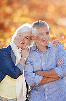 Senior couple, nature and thinking of future together in autumn, park or vineyard or happy, marriage in retirement or