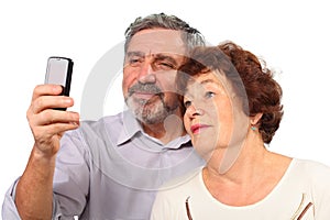 Senior couple photograph on mobile phone