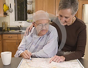 Senior couple planning a trip