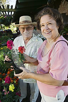 Senior Couple At The Plant Nursery