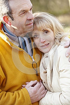 Senior couple portrait outdoors in winter