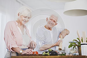 Senior couple preparing healthy meal