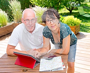 Senior couple preparing vacation trip