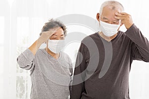 Senior couple with protective face mask