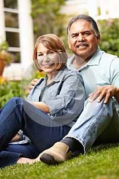 Senior couple relaxing in garden