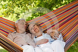 Senior couple relaxing in hammock