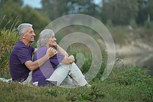 Senior couple resting outdoors