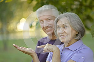 Senior couple resting outdoors