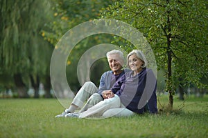 Senior couple resting outdoors