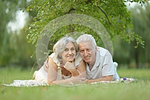 Senior couple resting outdoors