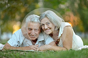 Senior couple resting outdoors