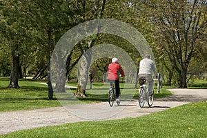 Senior couple riding bicycles