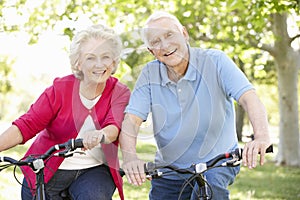 Senior couple riding bikes