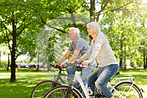 Senior Couple Riding Bikes photo
