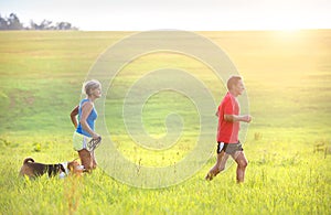 Senior couple running