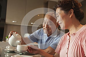 Senior couple sharing tea