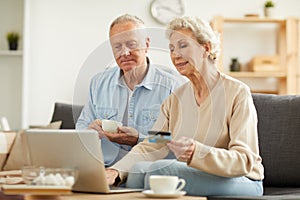 Senior Couple Shopping Online