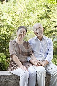 Senior Couple Sitting on a Bench