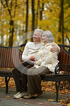 Senior couple sitting on bench