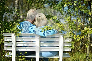 Senior couple sitting on bench