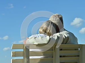 Senior couple sitting on bench