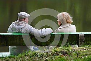 Senior couple sitting on a bench