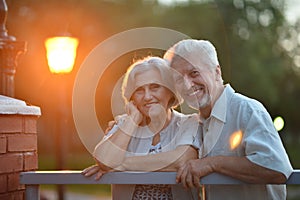 Senior couple sitting on bench