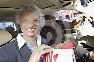 Senior Couple sitting in car, on Shopping Trip