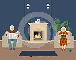 Senior couple is sitting in the living room near the fireplace