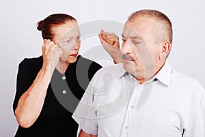 Senior couple situation in white isolated backgrou
