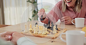 Senior couple, smile and chess on board with winning, problem solving or happy for achievement. Marriage, retirement and