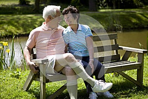 Senior couple smilling at each other