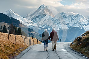 A senior couple taking a brisk walk in a scenic location.