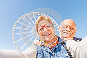 Senior couple taking selfie