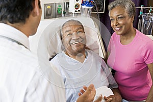 Senior Couple Talking to Doctor