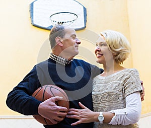 Senior couple throwing the ball