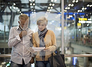 Senior couple traveling airport scene Concept