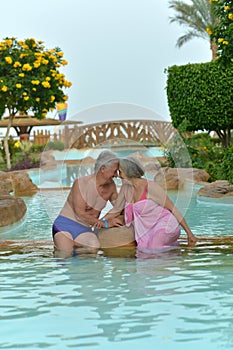 Senior couple at tropic hotel resort