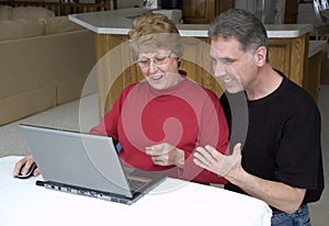 Senior Couple Using Laptop, Internet, Technology