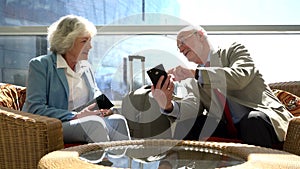 Senior couple waiting for flight