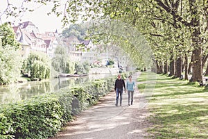 Senior Couple Walking Through A Park photo