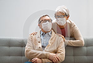 Senior couple wearing facemasks