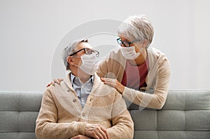 Senior couple wearing facemasks