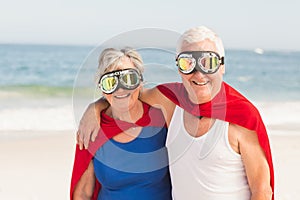 Senior couple wearing superman costume