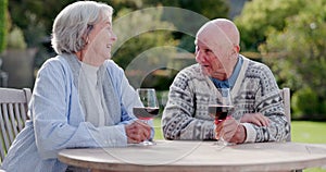 Senior couple, wine and looking in garden with happy marriage, love and care in retirement together. Elderly people