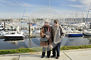 Senior couple at yacht harbor