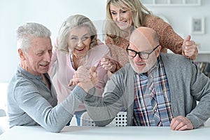 Senior couples using laptop