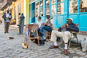 Senior cuban men playing traditional music in Havana