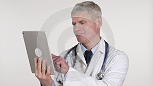 Senior Doctor Browsing Internet on Tablet, White Background