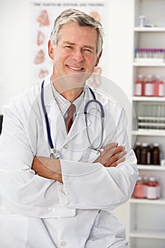 Senior doctor in consulting room